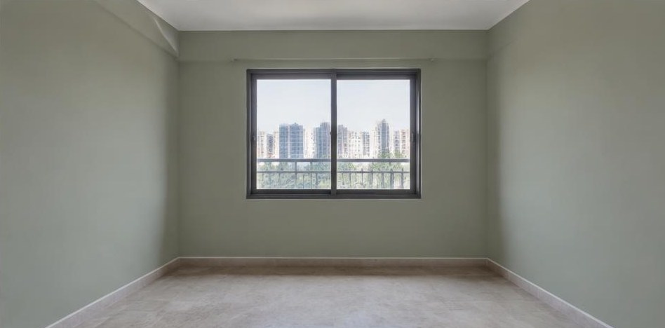 Illustrative after: Repaired, smooth walls with a fresh sage paint finish.